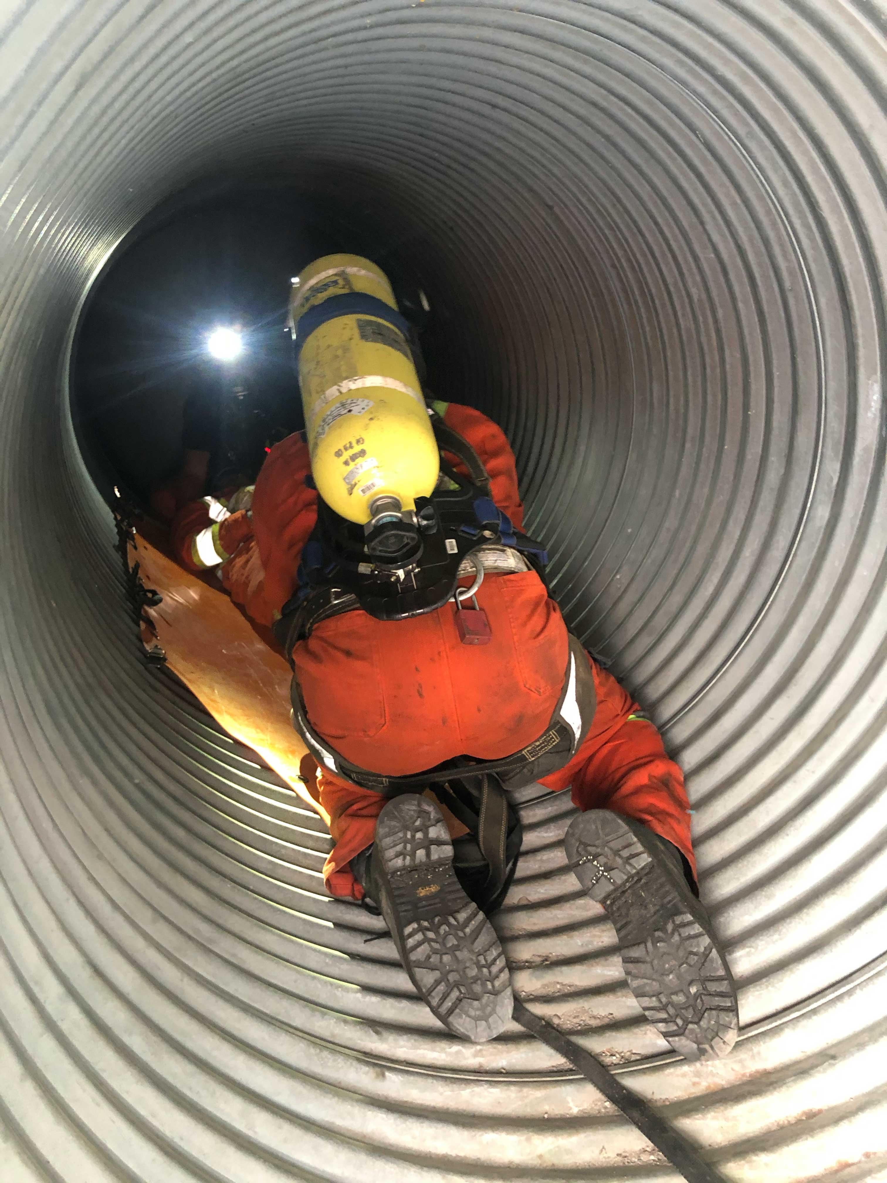 Confined space rescue with stretcher inside a culvert